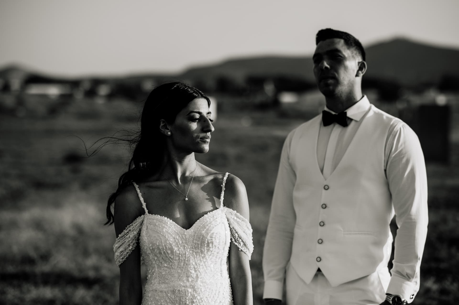 A bride and groom in the last light of the day
